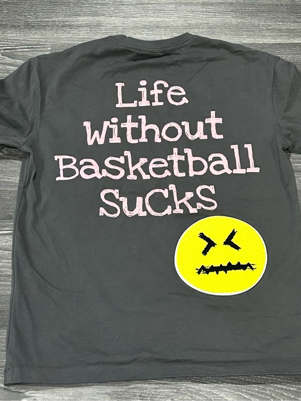Grey Short Sleeve Graphic Tee with Pink Text and Yellow Smiley Patch Basketball